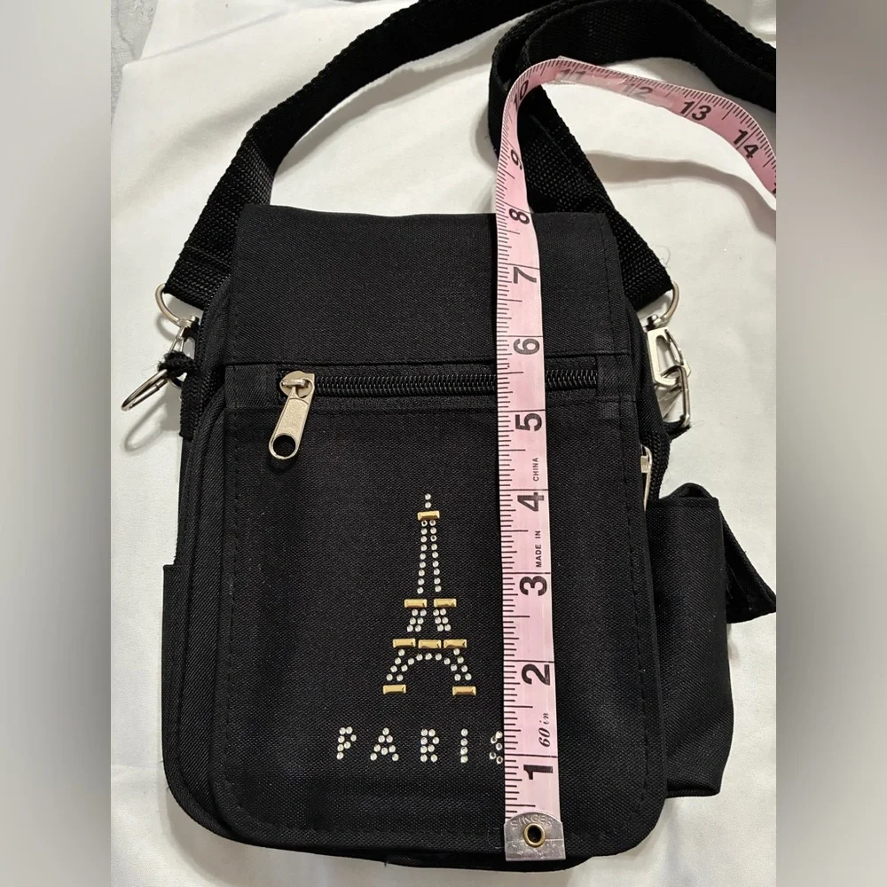 Petit Crossbody with Paris Bling. 3 Zippered pockets. 32” + detachable strap